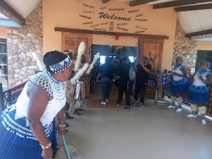 The Zulu dance group welcoming people visitors at the Phezulu Safari Park. 