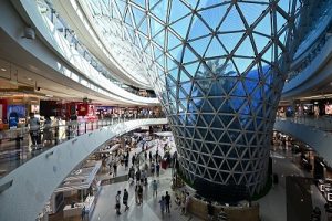 Tourists visit an international duty free mall in Sanya, south China's Hainan Province, June 23, 2022.