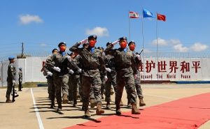 Chinese peacekeepers march at a medal parade ceremony in Hanniyah village, southern Lebanon, July 1, 2022. 